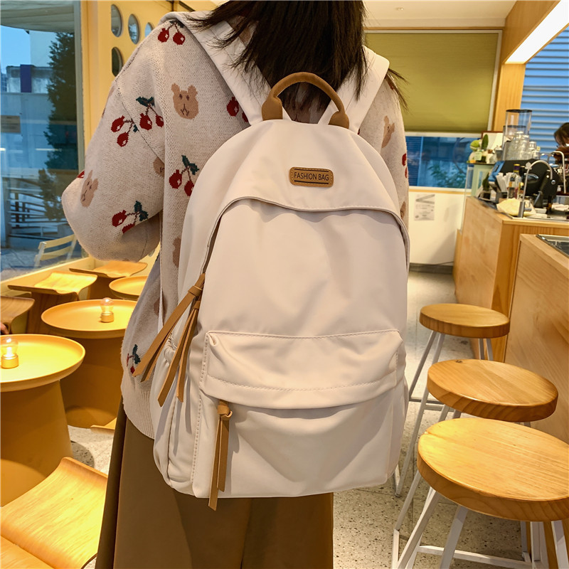 New Korean-style schoolbag for girls, simple and elegant, cute backpack for middle school and college students, travel bag with a sense of luxury