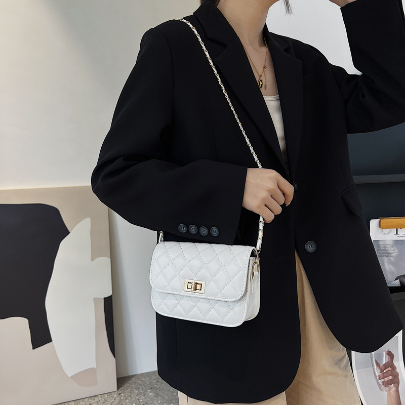 快递盒/手提包女/可扩容双肩背包硬壳/硬壳双肩背包/草编包女斜跨时尚细节图