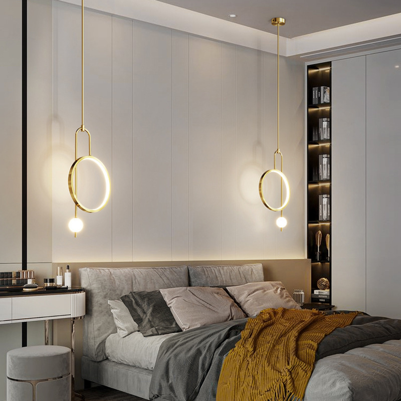 The bedside chandelier in the bedroom is a modern and simple Nordic light luxury living room background wall. It is a creative bedside lamp designed by a popular designer Application Scenario