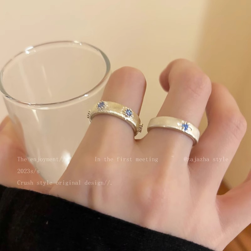 A sea blue cross brushed zircon ring, a niche design for women, is a couple's index finger ring with a simple and elegant style on Instagram Specification image