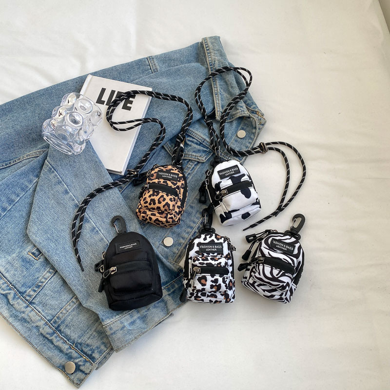 Korean mini children's bags are popular in foreign trade. Leopard print girls' single-shoulder crossbody bags, outdoor travel headphones, bag mouth red envelopes