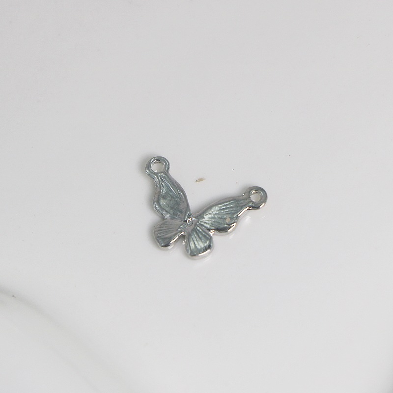 New zinc alloy two-color oil painting series double-hole butterfly DIY earrings, pendants, bracelets, necklaces and accessories Application Scenario