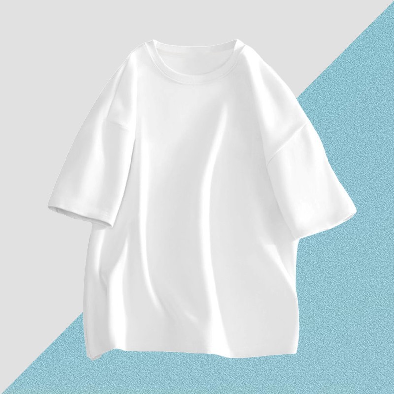 A new summer fashion brand for men in 2025, featuring a pure cotton, versatile short-sleeved T-shirt. It's a niche high-street American loose top Application Scenario