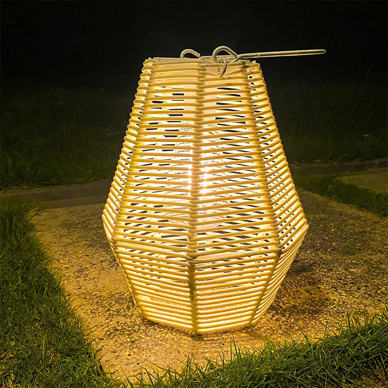 Outdoor solar lamp atmosphere decoration white lantern with handle imitation rattan weaving waterproof creative solar charging lamp Application Scenario
