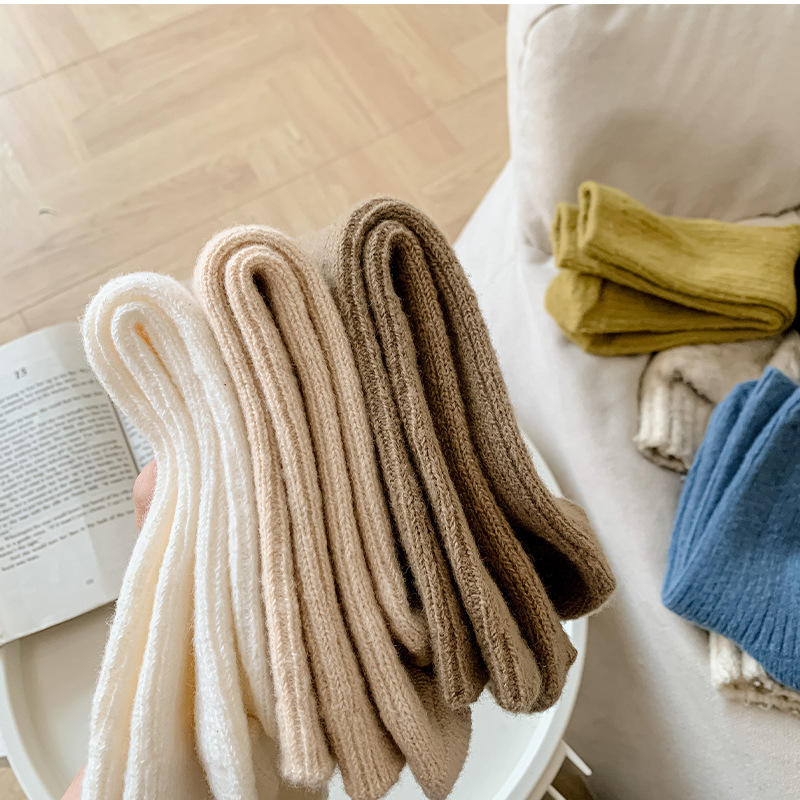 One-piece consignment of woolen socks for women in autumn and winter, solid color, double-stitch, versatile, long tube, thickened, loose-fitting, pile socks. Wholesale of women's socks in Zhuji, one-piece consignment Specification image