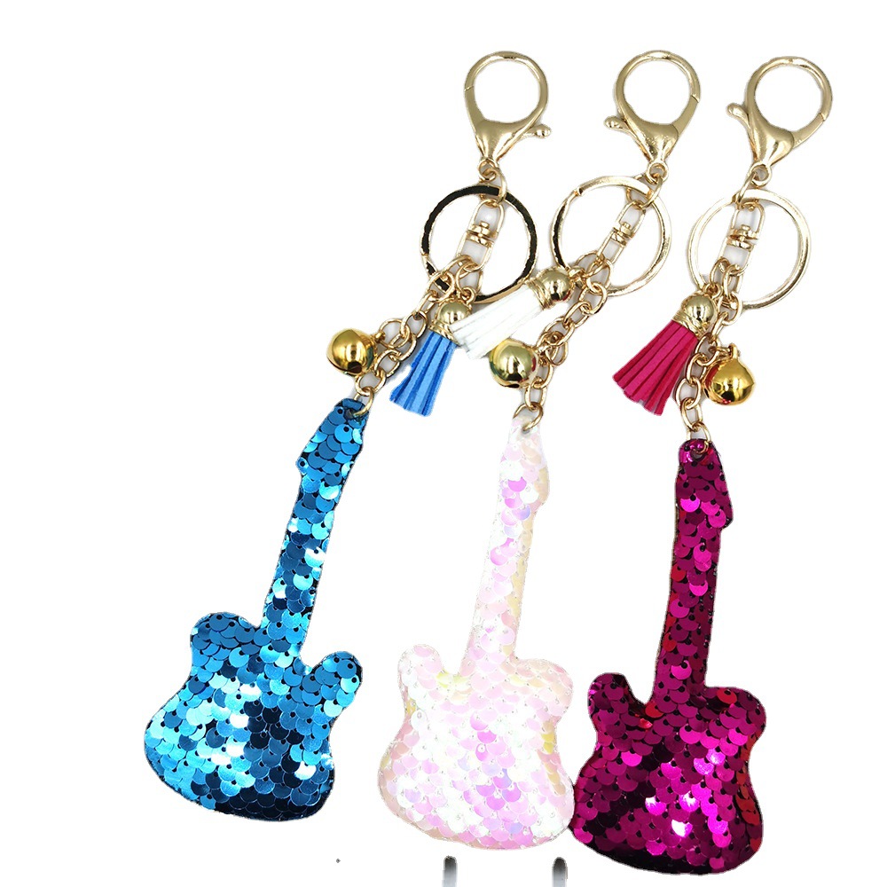 Cross-border anti-gloss guitar keychains, tassels, bells, sequins, bags, car trinkets, pendants, clothing accessories Item Picture