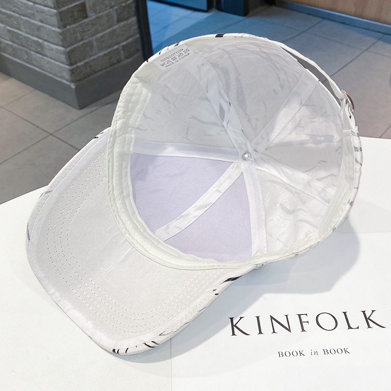 2023 Spring Summer New Bronzed Black And White Personality Baseball Cap Outdoor Mountaineering Sun Protection Creative Cap Application Scenario