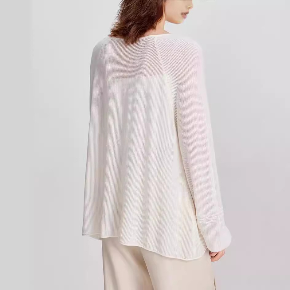 ELLE's new Summer 2024 collection of loose, soft and thin woolen sweaters featuring a blend of wool and satin with a round neck Specification image