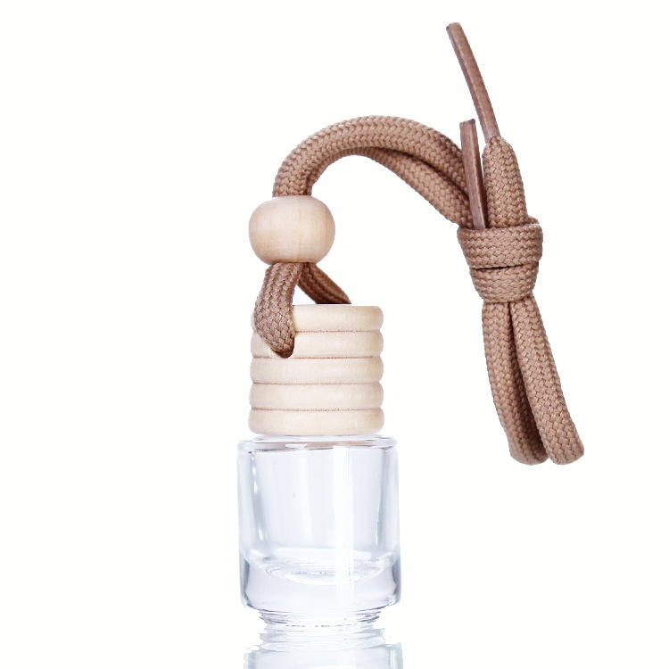 Cross-border wholesale 5ml creative wooden cap transparent pendant, essential oil pendant, glass cylindrical bottle, aromatherapy perfume empty bottle Item Picture