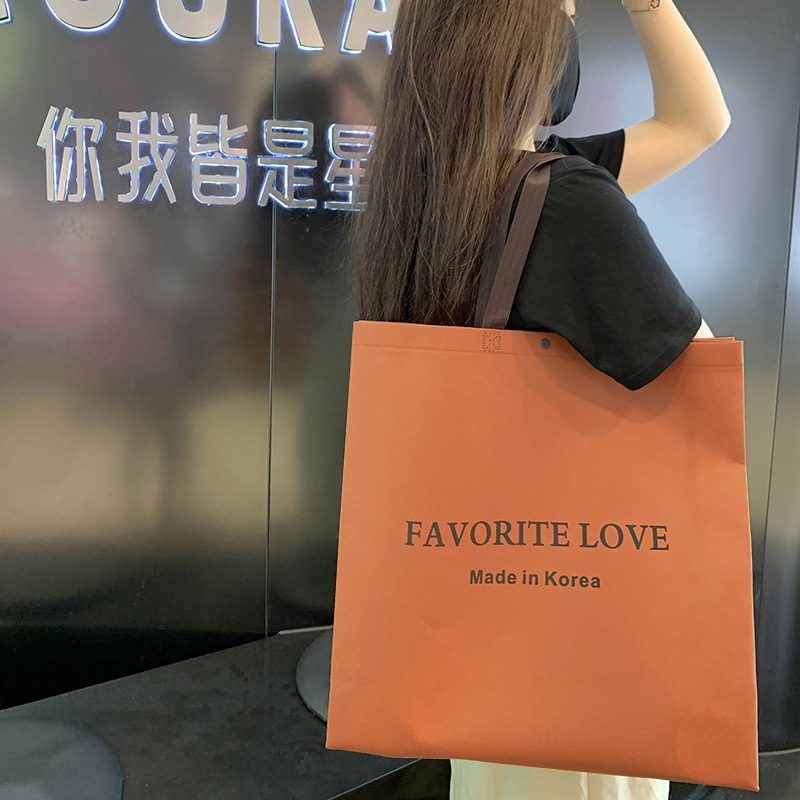 网红女装暗扣服装店无纺布手提袋定制购物袋手拎衣服袋定做logo