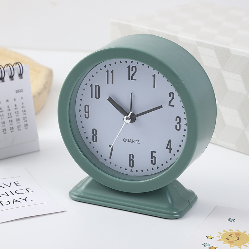 Creative circular digital simple alarm clock for children, students, bedside and home decoration, time-scanning clock Item Picture