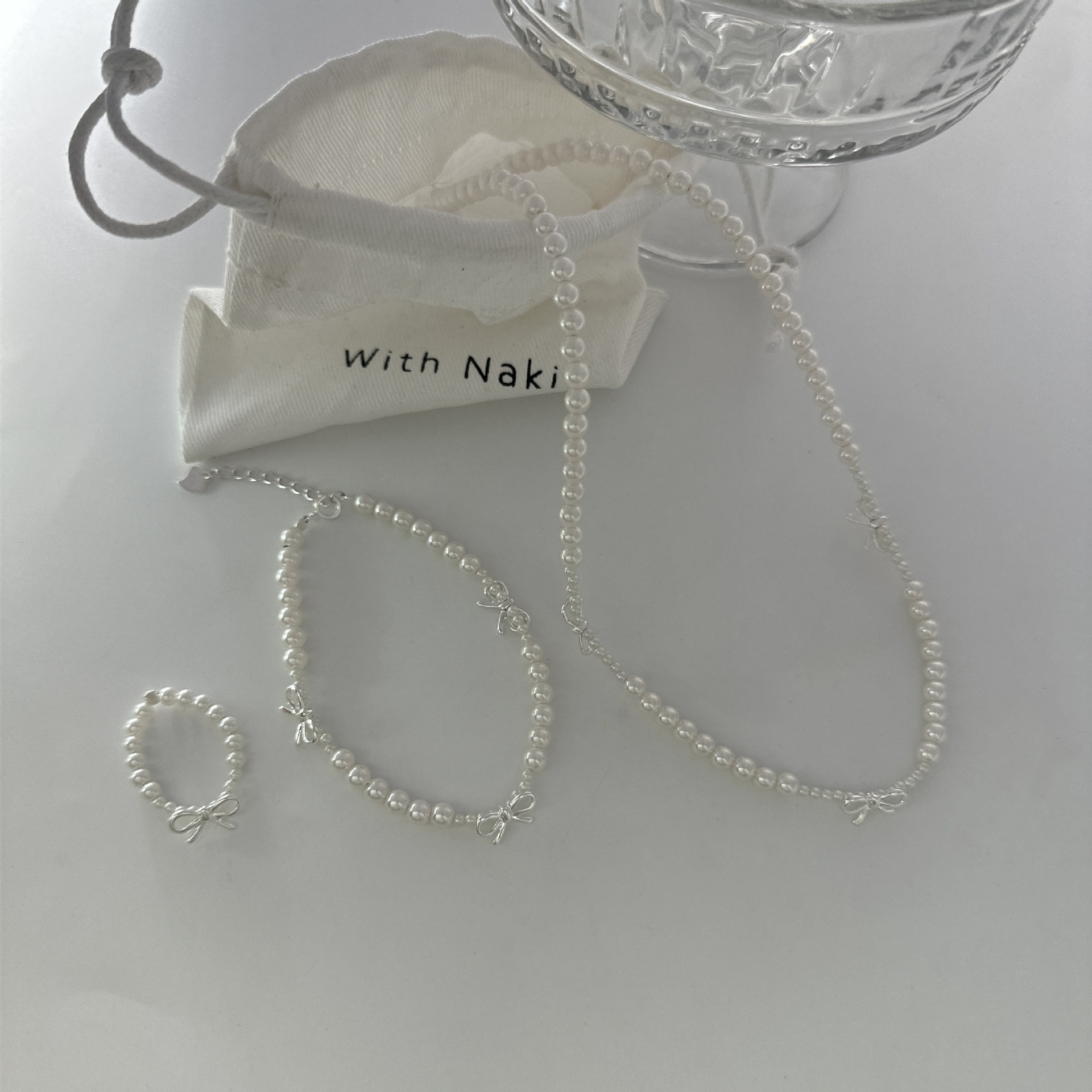Shi Family Pearl Bow pearl necklace, light luxury, niche design sense, high-end collarbone chain pearl necklace bracelet pic 5