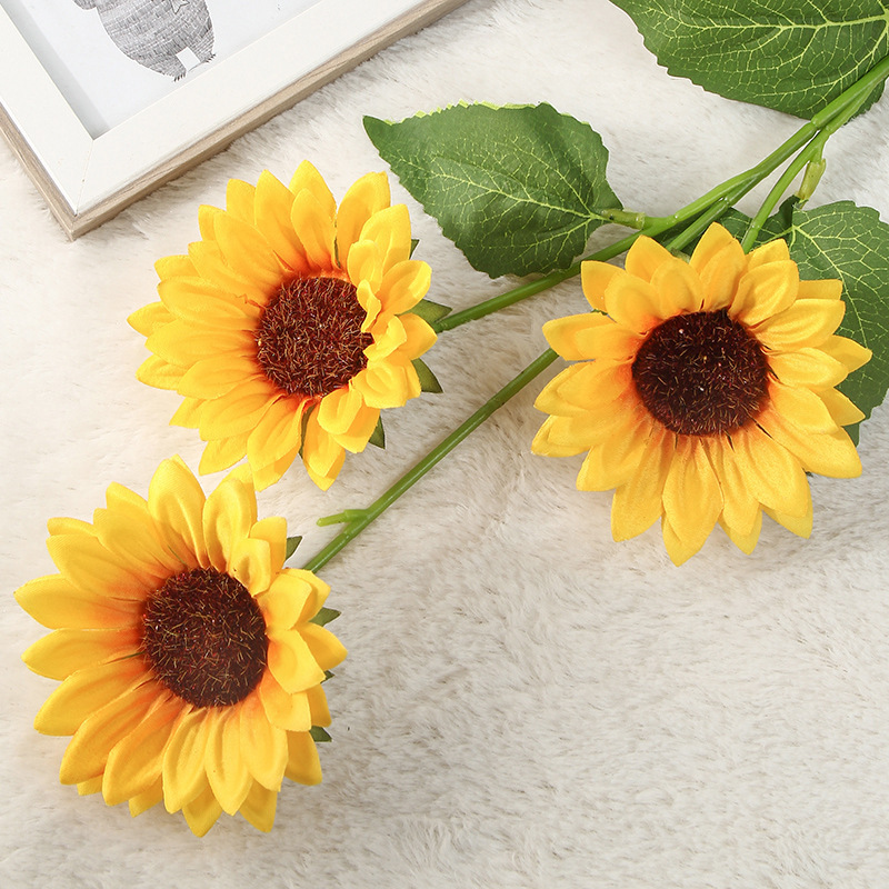Factory wholesale three-head sunflower simulation flower bouquets, simulation green plant artificial flowers, New Year decorative flower arrangements and ornaments details Picture