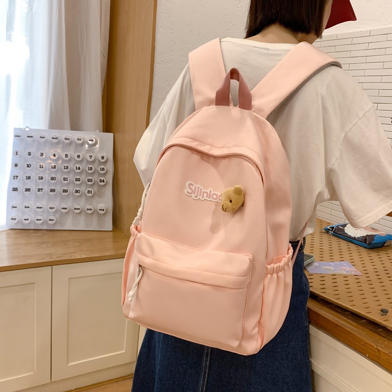 新款简约ins风双肩包女大学生初中高中小学生书包简约百搭背包男