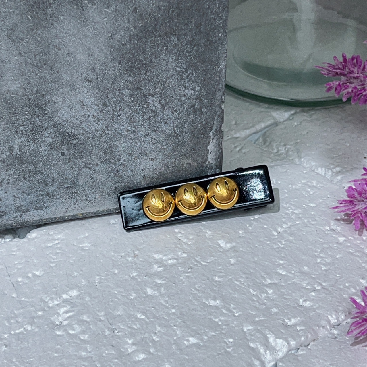 A high-end, French-style black leather hairpin at the back of the head for women