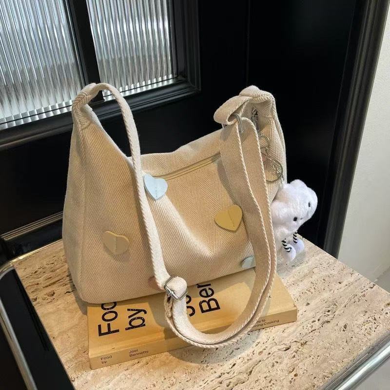 休闲帆布斜挎包女2025新款大学生上课潮牌小众百搭通勤单肩饺子包详情16