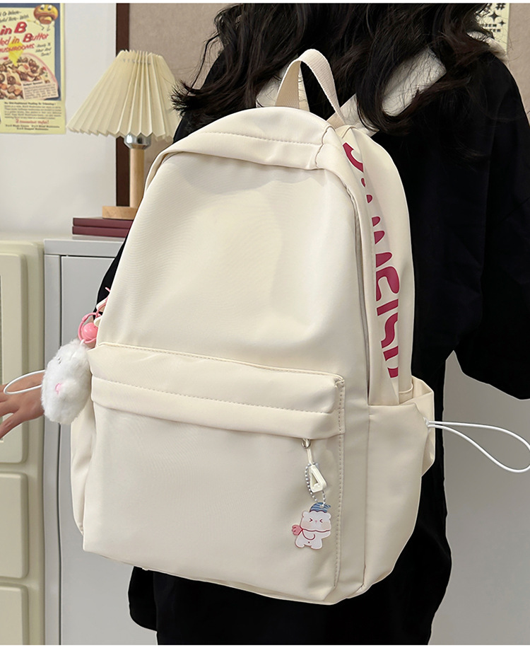 大容量书包女初中生少女简约百搭日系高中大学生双肩包设计感背包详情20