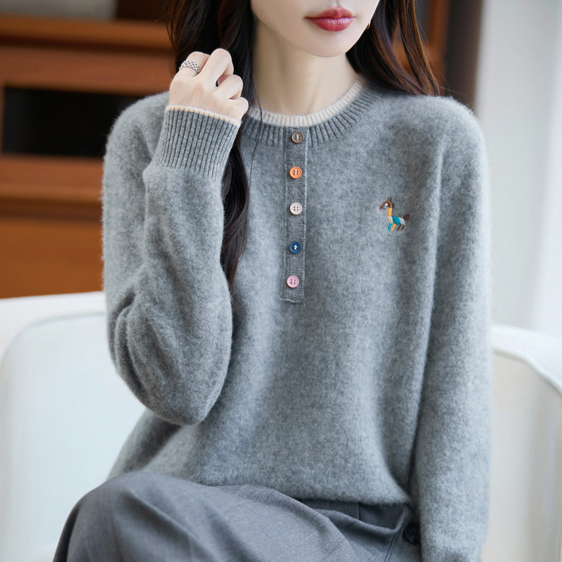 This is a new 100% pure wool sweater for women in autumn and winter. It features a color-blocked round-neck embroidered small horse knitted sweater and a loose, slimming base layer