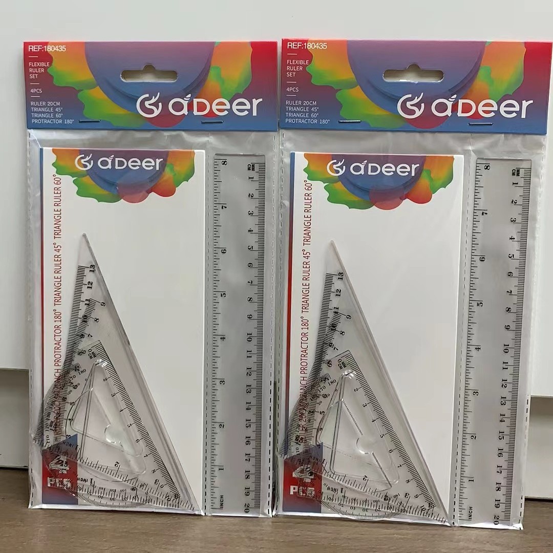 A set of four 20cm transparent office rulers