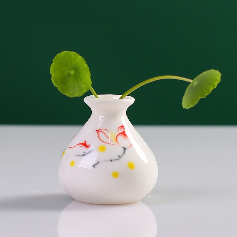 Xiaoyin Ceramic Creative Mini Ceramic ornaments, hotel furniture and supplies, small vases, living room small plate decorations, modern and simple Application Scenario
