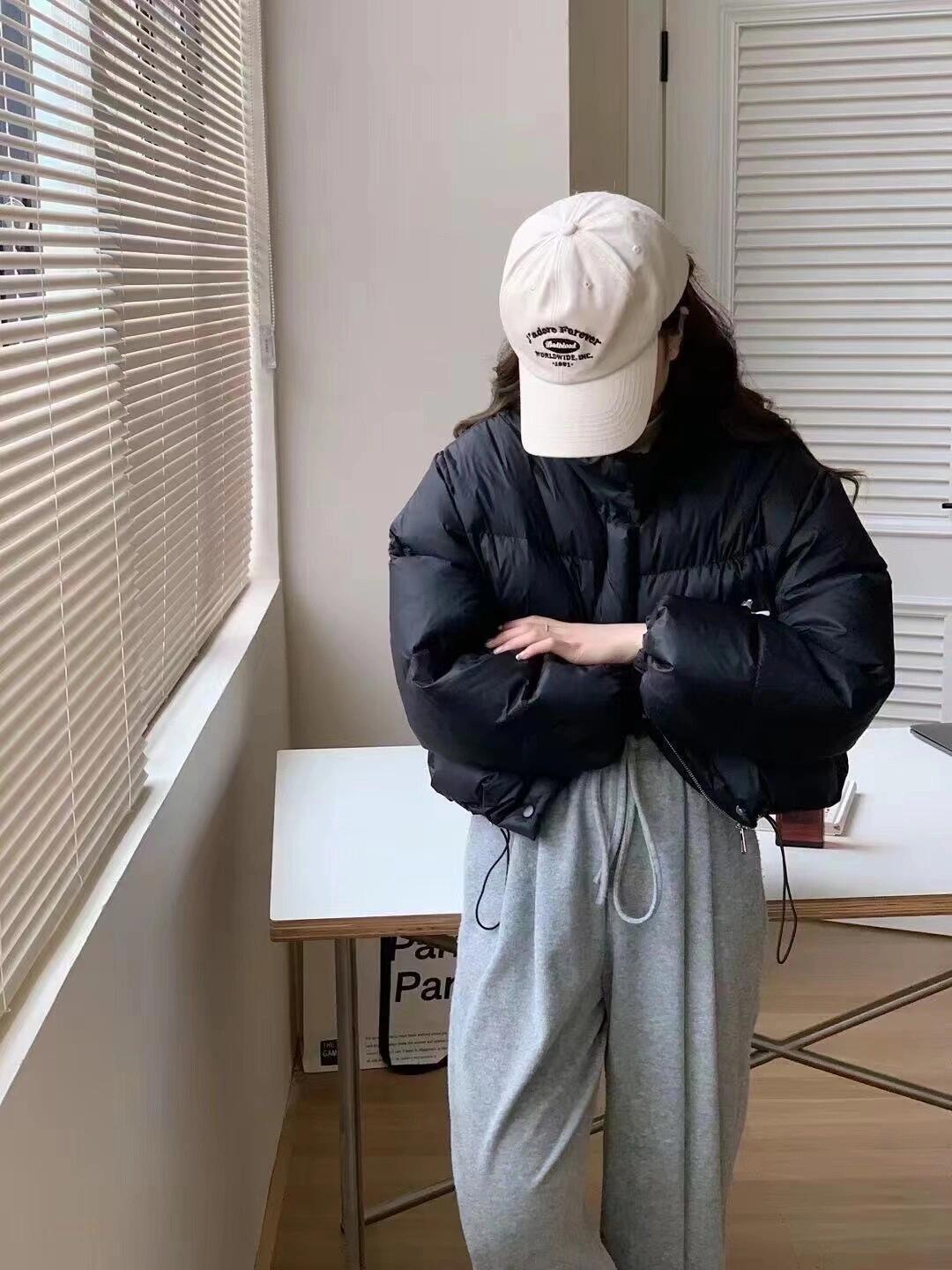 In the winter of 2025, the Korean version of the new down jacket for women features a short stand-up collar, loose and thick white duck down coat for petite women pic 25
