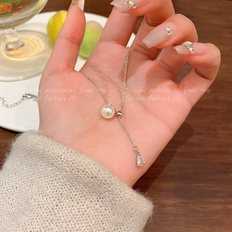 项链/珍珠项链/珍珠/饰品四叶草/毛衣链女长款百搭产品图