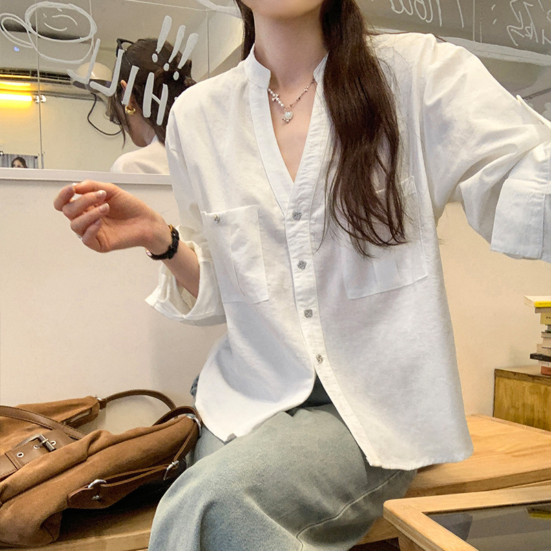 现货热销韩系半排扣正肩V领宽松长袖衬衫女通勤新款独特设计感上