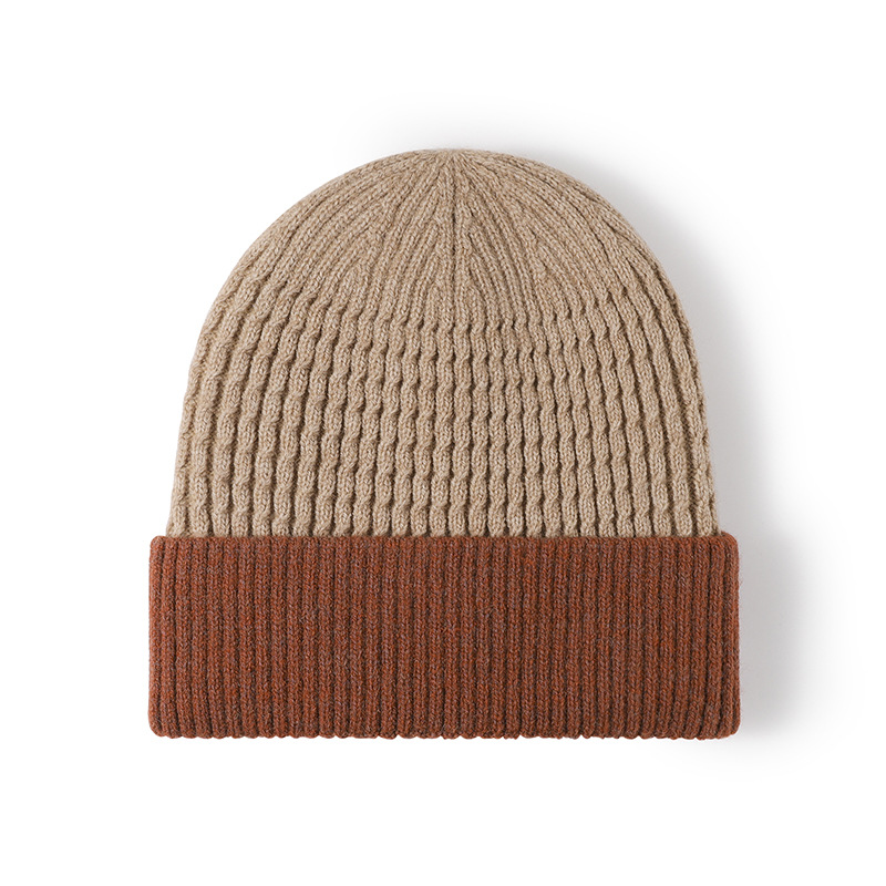 Beanie folded neatly inside coat pocket