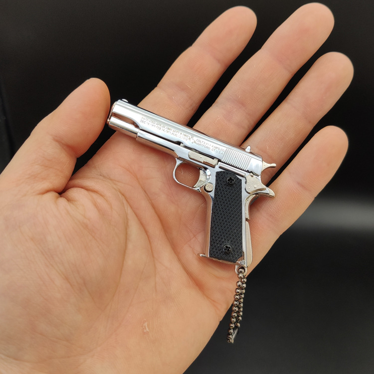 Eat chicken PUBG surrounding 1:3 metal 1911 gun model toy keychain pendant gift