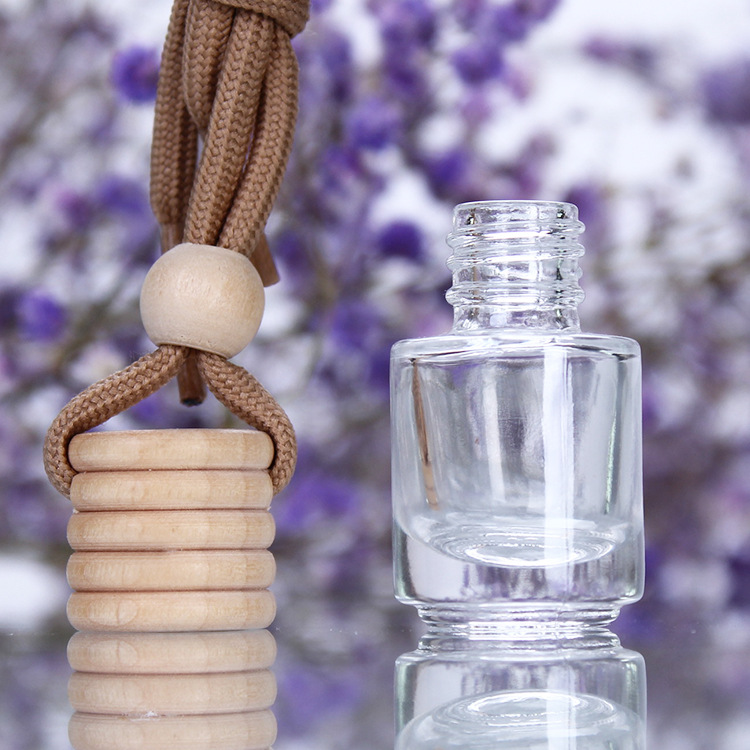 Cross-border wholesale 5ml creative wooden cap transparent pendant, essential oil pendant, glass cylindrical bottle, aromatherapy perfume empty bottle Application Scenario