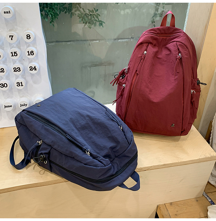 Female lightweight backpack for junior and senior high school students, Japanese-style casual schoolbag. Female college students, simple solid-color backpack. Female school style pic 19