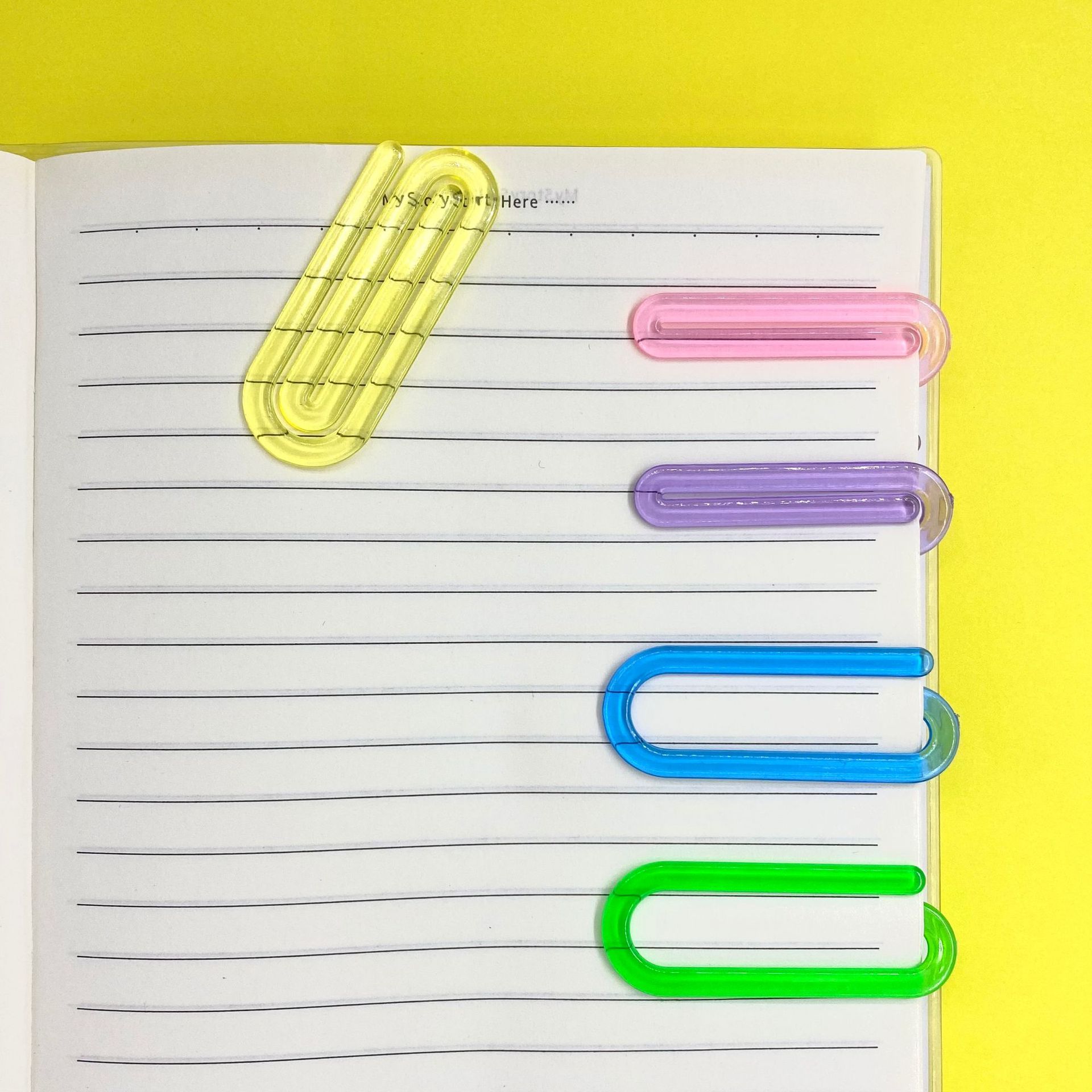Wholesale of colorful serpentine paper clips, irregular-shaped paper clips, creative and cute office supplies, bookmarks, plastic clips and folders details Picture