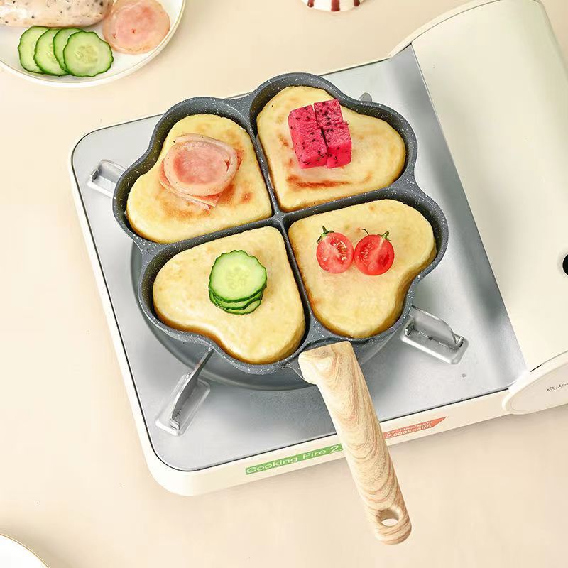 A home-use tourmaline heart-shaped four-hole egg-frying breakfast pan Application Scenario