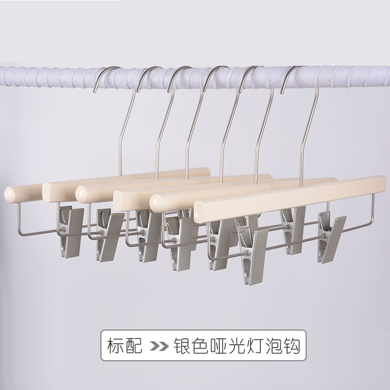 Wholesale of clothing store hangers for women's clothing, cream-colored solid wood hangers, Korean version anti-slip wooden clothes and trouser racks details Picture