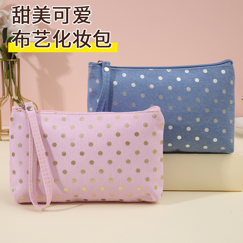 圆点化妆包甜美护肤品收纳包手拎便携式小零钱包旅行手拿洗漱包