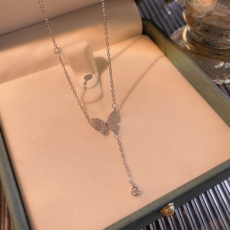 Korean-style design butterfly zircon tassel titanium steel necklace, a versatile, niche and light luxury collarbone chain accessory with a cold style