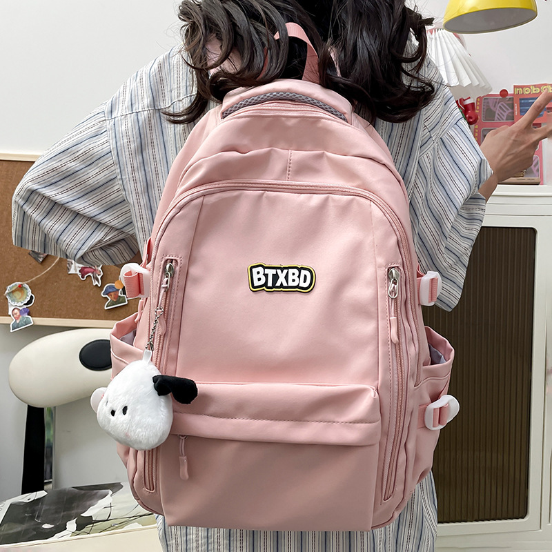 A large capacity, high appearance level, Korean waterproof backpack for middle and junior high school students, and a fashionable travel backpack