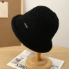 This autumn and winter knitted basin hat is a versatile match for women. It features a lambskin texture, a round top hat, a Korean fisherman's hat, and a black label woolen hat. It's artistic Specification image