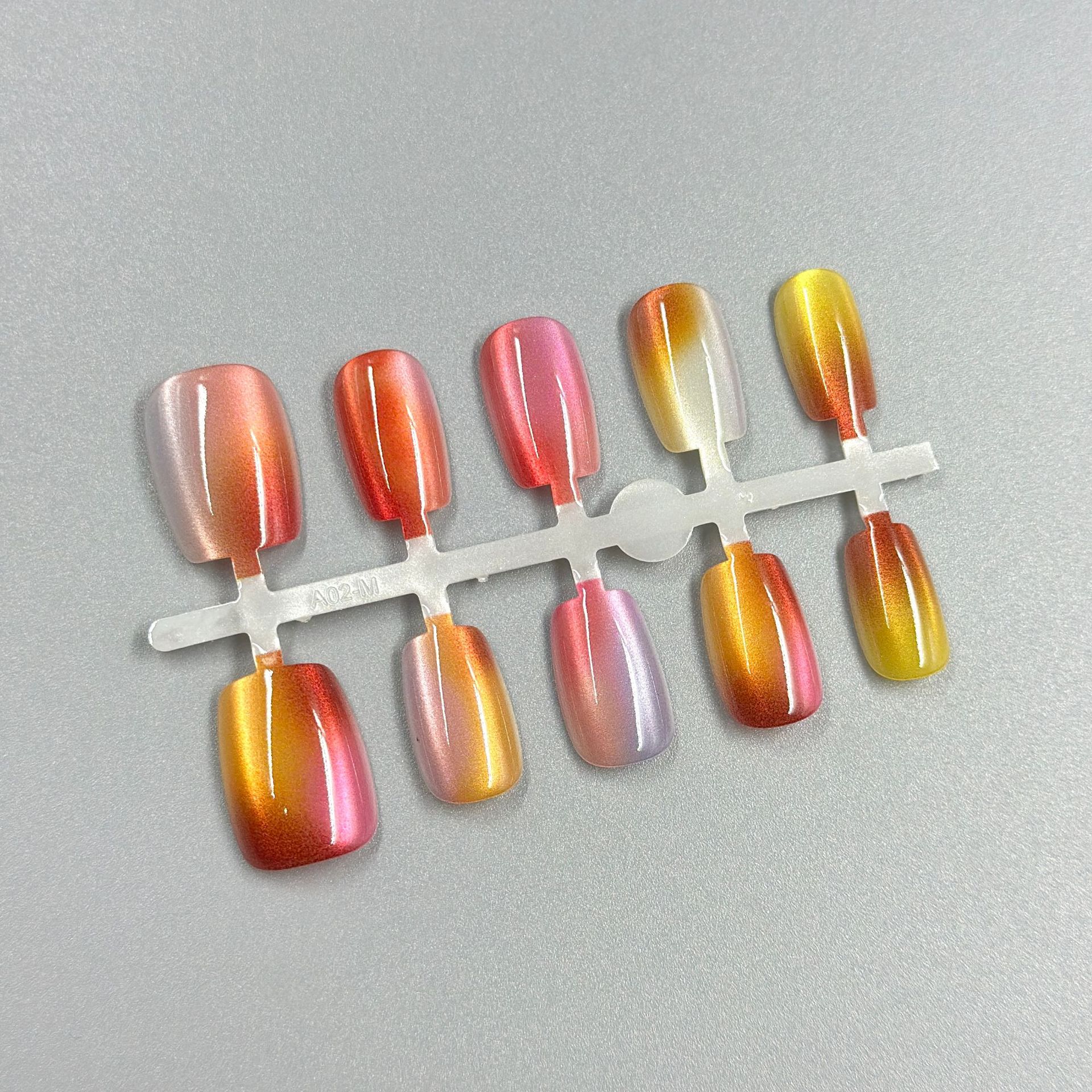 Hand-worn nail, phototherapy nail plates, pre-made nail plates in separate sizes, solid color cat's eye, cherry, white moonlight iridescence, wearable nail plates Specification image