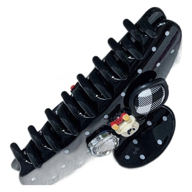 A new black and white polka dot Mickey Mouse bow letter hair clip from South Korea, a fashionable and high-quality shark clip hair accessory for women Item Picture
