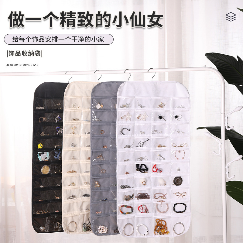 Double-sided non-woven fabric jewelry and accessory storage bag with 80 compartments, jewelry and miscellaneous items organization and storage hanging bag, small item storage bag