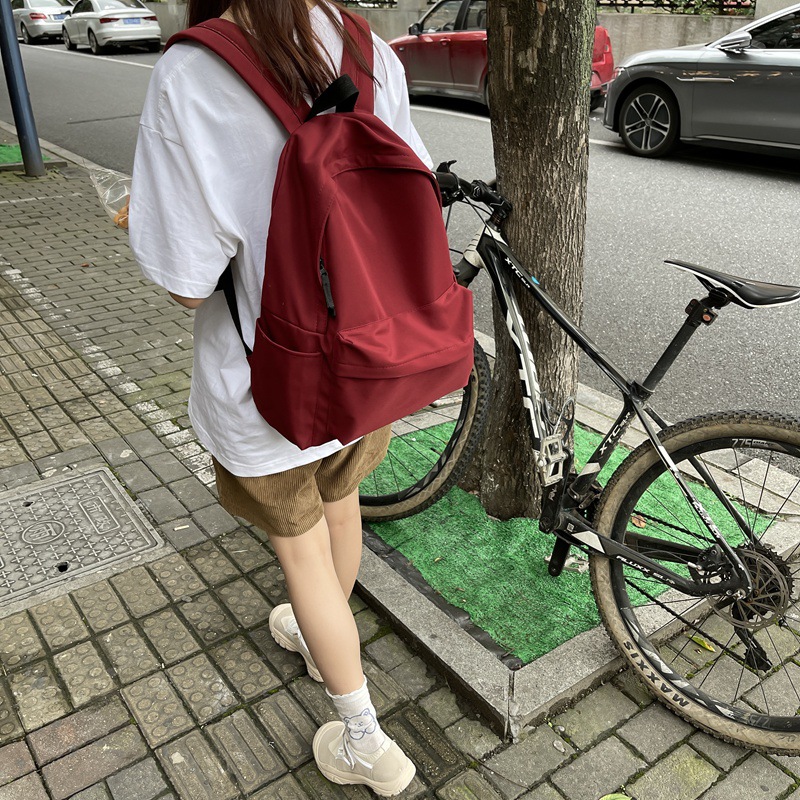 Mochila de viento japonés sin impresión para hombres y mujeres para estudiantes universitarios versión coreana de gran capacidad mochila de color sólido para estudiantes de secundaria y secundaria details Picture