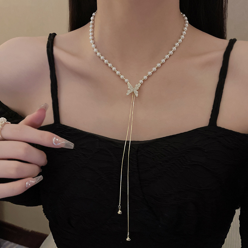 Douyin's best-selling pull-out pearl necklace, a versatile and niche design for women, butterfly pendant, collarbone chain accessory wholesale details Picture