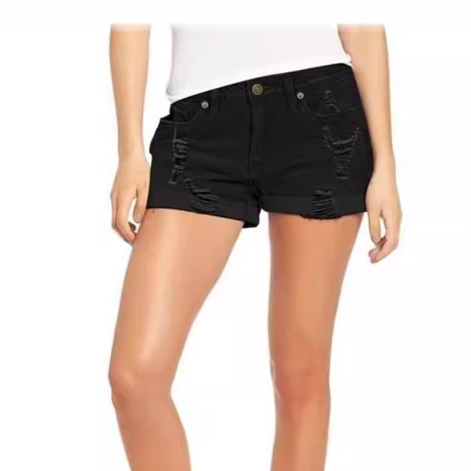 A woman wearing ripped and rolled-up denim shorts for European and American trade Item Picture