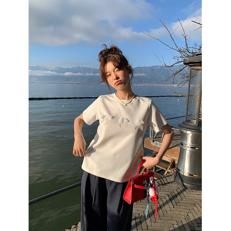 Aisili 2025 Spring Korean ballet-style lace bow design Versatile short-sleeved T-shirt for women 13316