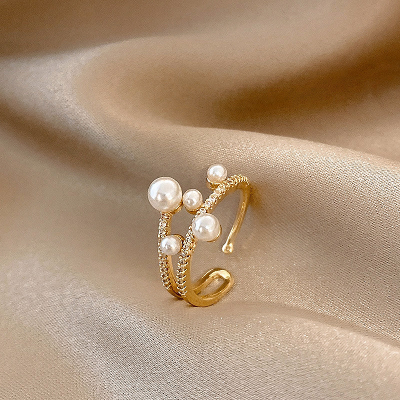 Japanese And Korean Simple Temperament Adjustable Ring Female Korean Light Luxury Pearl Open Ring Net Red Retro Personality Food Ring Application Scenario