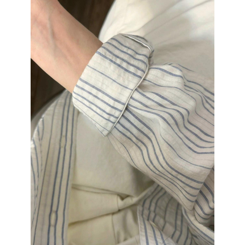 衬衣/衬衫女长袖韩版/打底衫女长袖韩版/长袖衫女/绸布偏襟衣产品图