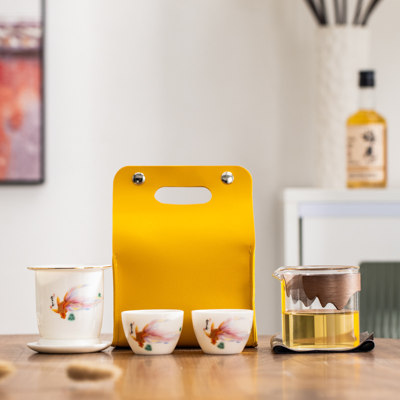 The Wujiang Sheep Fat Jade Porcelain Kung Fu Tea set travel bag is a high-end souvenir for outdoor travel. Wholesale