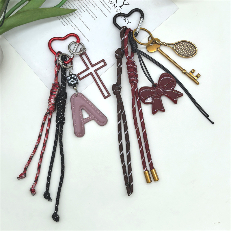 Cross-border bestsellers: Five-pointed star heart-shaped letter keychain, woven rope bag pendant, unique pendant, miu series Specification image