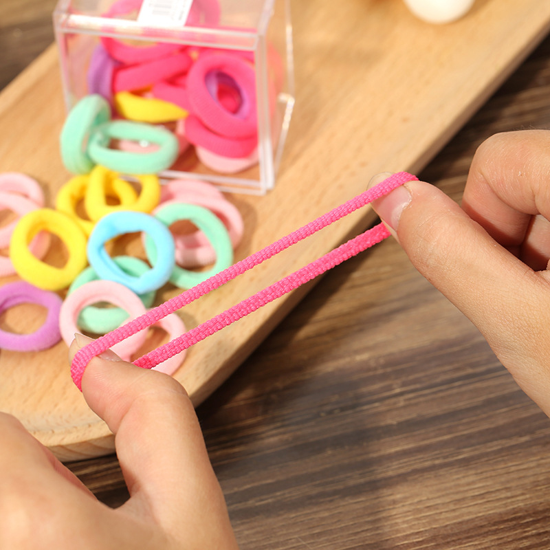 Candy-colored towel bands are directly supplied to Korean children. They are small, multi-color hair ties with high elasticity and simple solid color hair bands and hair accessories Application Scenario